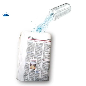 Líquido en periódico